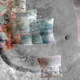 Greenish colors in this false-color image of Jezero crater indicate carbonate minerals.
